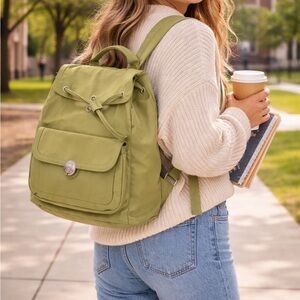 KIPLING LIGHT GREEN SPACIOUS BACKPACK OR
BOOKBAG